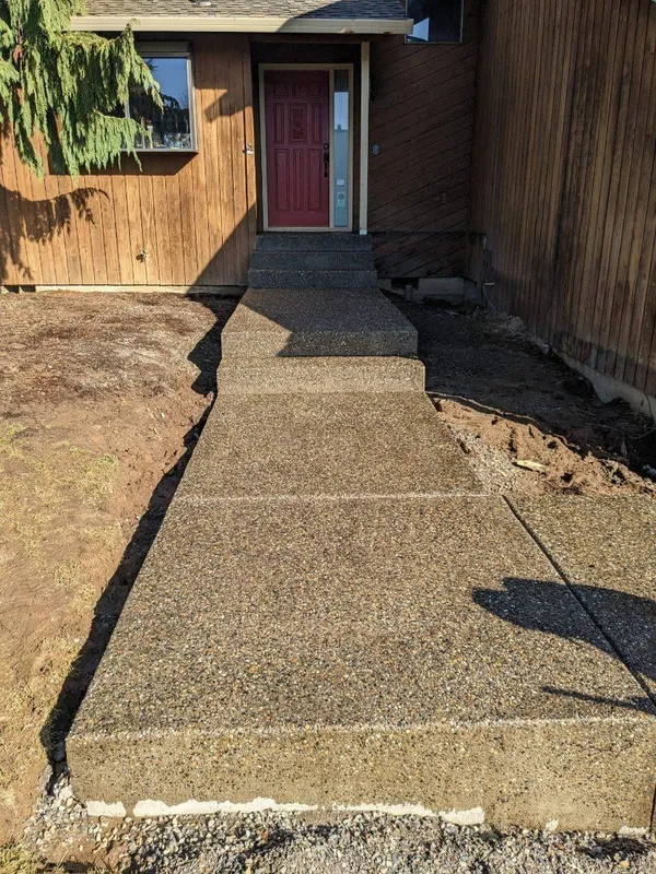 Decorative exposed aggregate concrete walkway